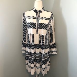 Black and white tiered bell sleeve dress